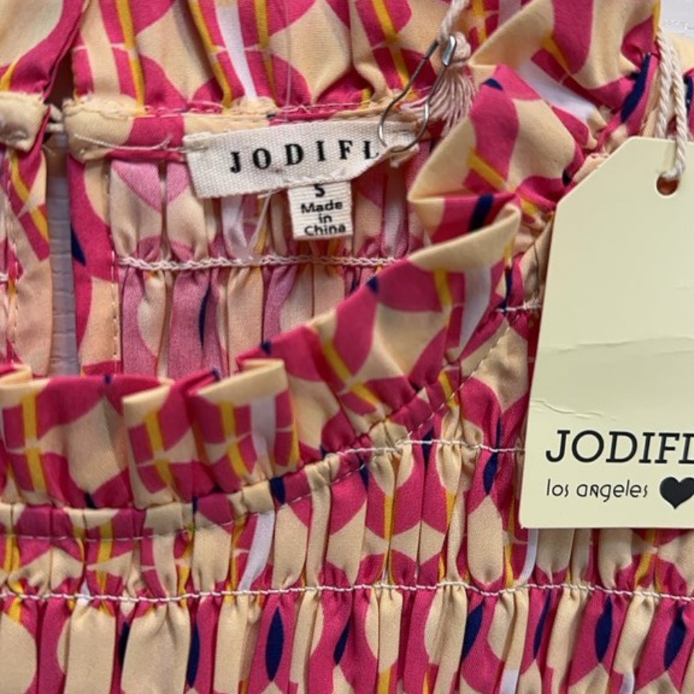 JODIFL Pink & Cream Smocked Flutter Peplum Tunic - Picture 2 of 3